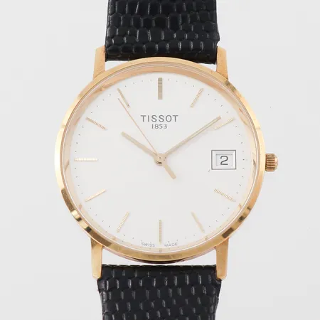 Herrur Tissot, diameter ca 33.4 mm, fungerar ej troligen batteriet, etui medföljer, 18k.