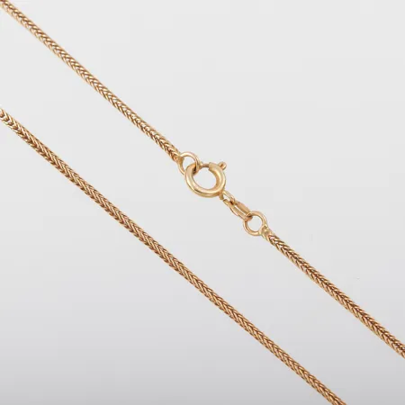 Collier, längd 62 cm, bredd 1.5 mm, 18k. Vikt: 7,8 g