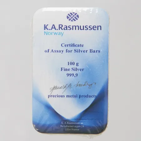 Silvertacka, K.A.Rasmussen Norway Fine 0,999 Silver, plomberad, 100gr. Vikt: 100 g