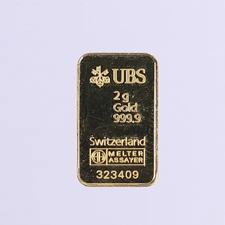 Guldtacka, UBS, serienr: 323409, bruten plombering, 24K Vikt: 2 g