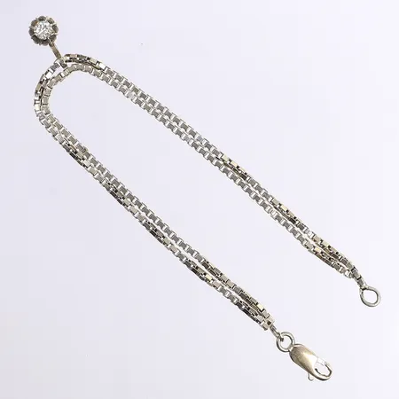 Armband med diamant, ca tot 0,20ct, 19cm, bredd 3mm, vitguld, behov av omrodiering, vitguld, 18K Vikt: 8,6 g