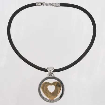 Collier Bvlgari, Tondo Heart Pendant, på läderrem med lås i metall, B-zero1, längd 39cm, höjd på hänge 58mm, bredd 43mm, stål och guld, inga tillbehör. Vikt: 38,6 g