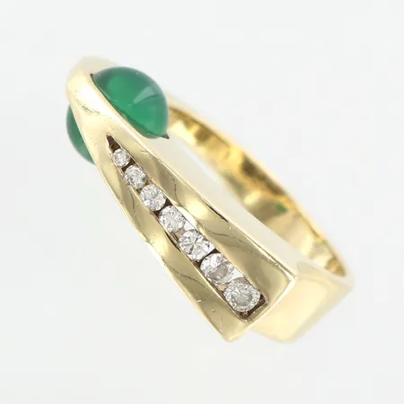 Ring med diamanter 7st ca 0,15ctv och grön sten, stl 16½, bredd 7mm, 14K Vikt: 7 g