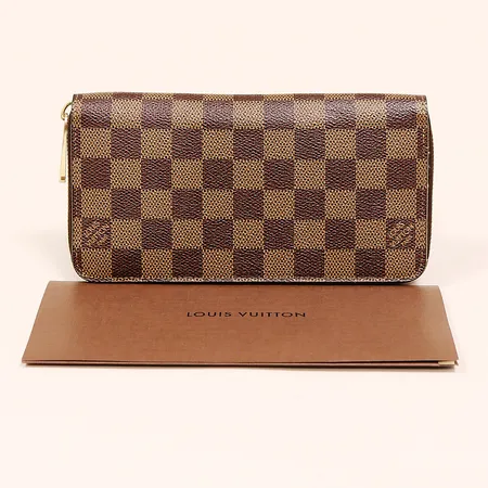 Plånbok Louis Vuitton, brun Zippy Wallet Damier, N60015, detaljer i gulmetall, 19,5x10cm, datumkod Spanien 2015, åtta kortfack, sju övriga fack varav ett med dragkedja, kvitto Köpenhamn Juni 2015, inga tillbehör.