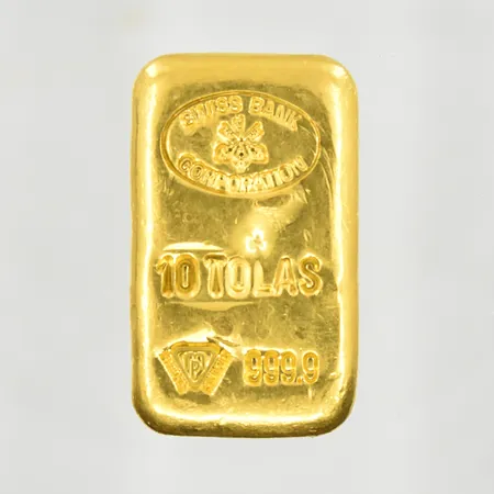 Guldtacka, Swiss Bank Corporation, 10 Tolas, längd 45 mm, bredd 27 mm, 24K. Vikt: 116,6 g