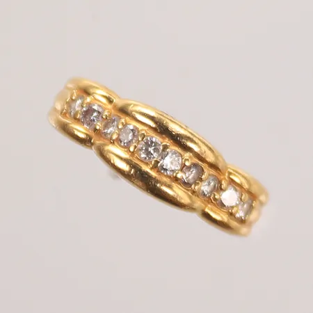 Ring med 10 diamanter 0,30ct totalt, stl 16, bredd 3-6mm, 18K, 4,4g Vikt: 4,4 g