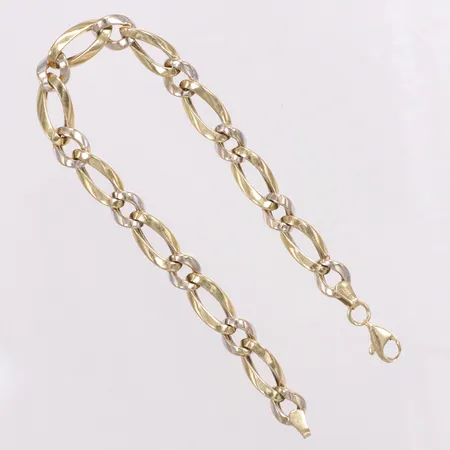 Armband, tvåfärgat, Guldfynd, 19cm, bredd 7mm, små bucklor, 18K  Vikt: 7,6 g