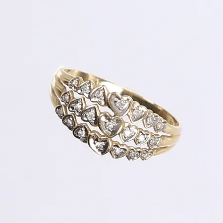 Ring med små diamanter totalt ca 0,10ctv, stl 17½, bredd 1-9mm, 18K Vikt: 2,3 g