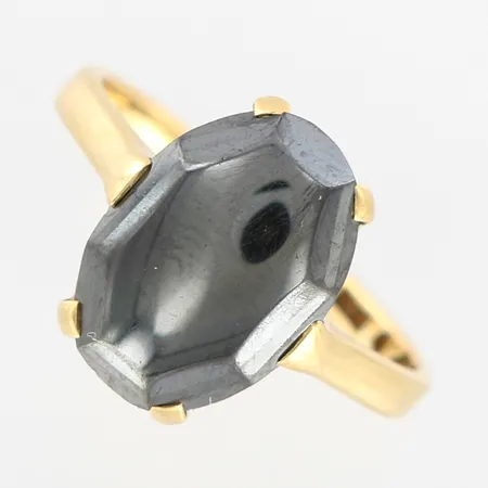 Ring med svart sten, slt 17¼, bredd 2-14mm, 18K Vikt: 5,5 g