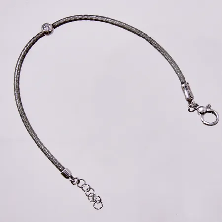 Armband med vit sten, längd: ca 17,5-19,5cm, bredd: ca 2-5mm, GHA, 925/1000 silver  Vikt: 5,8 g