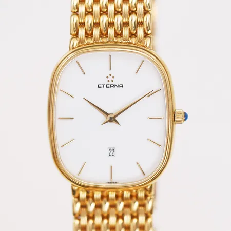 Armbandsur Eterna, quartz, integrerad länk, 18K guld, serienummer 160.3097.68S, står still/behov av batteribyte, smärre slitage, ytliga repor, bruttovikt 71,2g, inga tillbehör. 