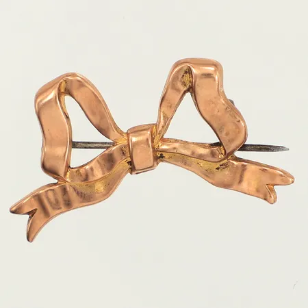 Brosch rosett, längd ca 20mm, bredd ca 35mm, nål i metall, 9K Vikt: 2 g