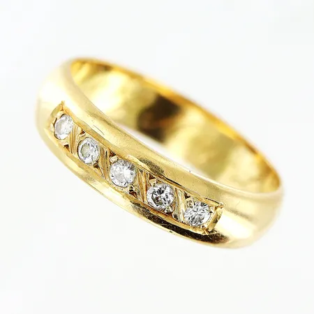 Ring, diamanter 5 x ca 0,03ct, stl 18¾, bredd 4,5mm, 18K.  Vikt: 4,7 g