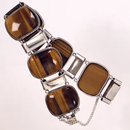Armband med tigeröga, längd ca 21cm, bredd 27,5mm, säkerhetskedja, importstämpel, 835/1000 silver. Bruttovikt 60,2g Vikt: 60,2 g
