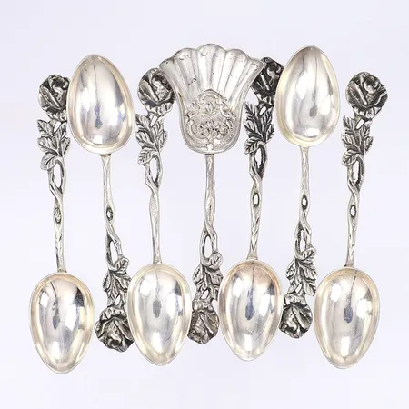6 rosenskedar samt 1 sockerskopa, 9cm, silver 830/1000 Vikt: 56,8 g