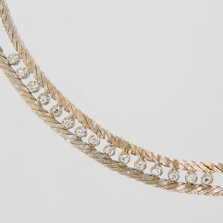 Collier, åttkantslipade diamanter 15xca0,03ct, längd:42,5cm, bredd:2,5-8mm, importstämplad, vitguld, 18K. Vikt: 31,3 g