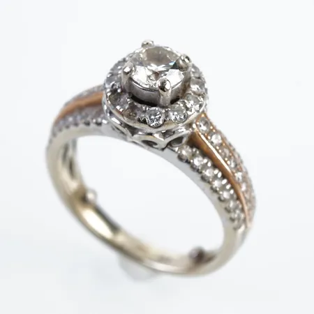 Ring m diamanter, 1 x ca 0,37ct samt flera mindre, vitguld/gulguld, stl 15½(48)med dobbar, 16½(52) utan dobbar, Ï9mm, 18k Vikt: 5,7 g