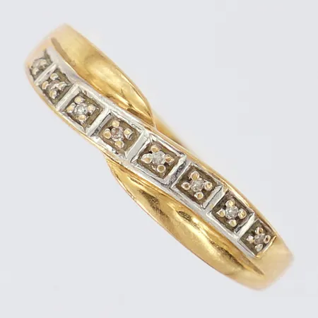 Ring med diamanter, 8xca 0,005ct, stl: 17¾. bredd: 1,9mm, GHA, 18K Vikt: 2,7 g