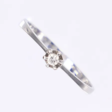Ring med diamant 1x ca 0,03ct stl 17, bredd 2-3mm, vitguld 18K Vikt: 1,3 g