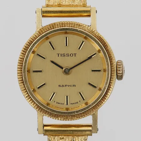 Damur Tissot, Saphir, manuell, Ø21mm, boett i 18K guld,  länk i förgyllt stål, längd 17cm, bruksslitage, defekt länk, 18K guld, bruttovikt: 22,1g. 