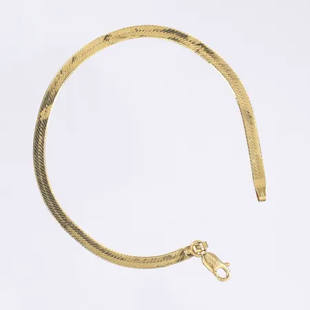 Armband Balestra, manglad pansarlänk, längd 17,5cm, bredd 3mm, något bucklig, 18K Vikt: 3,1 g