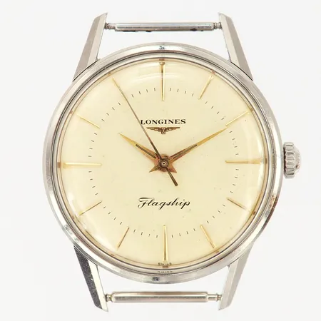 Herrur Longines Flagship, stål, manuell, boett-nr: 1045645, kaliber 30L, serie-nr: 11113919, Ø35mm, plexiglas med lätt slitage samt märken invändigt, urtavla med slitage, saknar länk/band, packning saknas, något repig boett, inga tillbehör