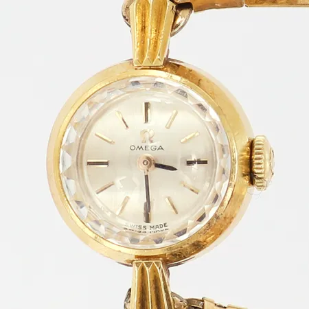 Damur Omega, boett i 18K, manuell, Ø17mm, länk i doublé med vita stenar, stenar saknas, personlig gravyr, något repig boett samt länk, inga tillbehör