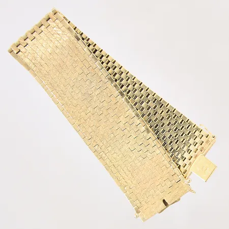 Armband, längd: 18cm, bredd: 24mm, ojämn, lås något slappt, 18K  Vikt: 75,1 g