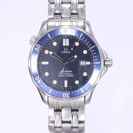 Herrur Omega Seamaster Profefessional, Ø41mm, quartz, datum, ref 196.1523, cal. 1538, serienummer 58406924, originallänk kort ca 14cm, bruksslitage, sliten dykarring, inga tillbehör
