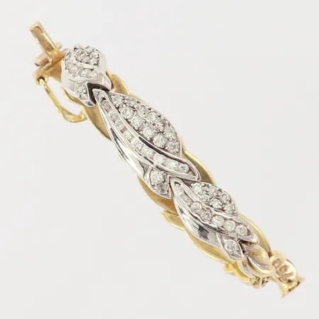 Armband med vita stenar, längd: 17,5cm, bredd: 4,7-8,2mm, delvis vitguld, 18K  Vikt: 9,8 g