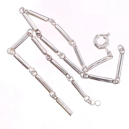 Collier Inger Stenborg, längd 50cm, bredd 5mm, defekt silver 925/1000.  Vikt: 77,9 g Skickas med postpaket.