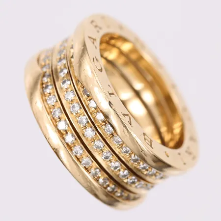 Ring, Bvlgari B-Zero1 med diamanter totalt ca 1,00ctv, stl: 16¾ (53), bredd: 10-11mm, italienska stämplar, 18K guld. Vikt: 14,7 g