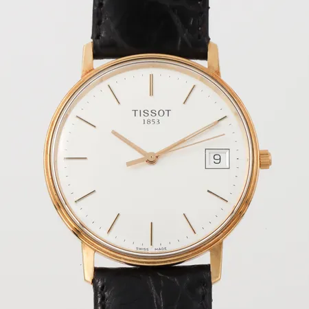 Herrur Tissot, behov av batteribyte, gravyr, diameter 33.4 mm, 18k.