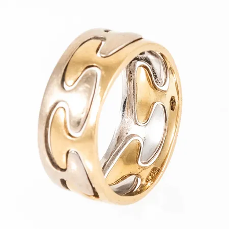 Ring i rött & vitt guld 18K. Den är 7,7mm bred, är i storlek 17½ och väger 5,2g. Stämplad GFAB (Guldfynd) 750.