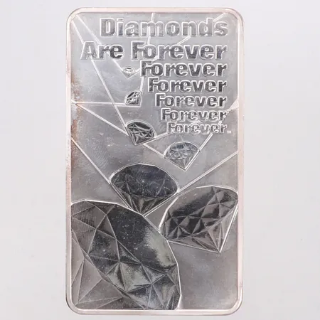 Silvertacka, 10 oz James Bond Diamonds Are Forever, 90x52x7mm, 999,9/1000 silver Vikt: 311,6 g