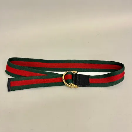 Bälte Gucci, rött/grönt tyg, modell: 132173, srn: 01798032, längd 98cm, spänne i guldfärgad metall, bruksslitage Vikt: 0 g