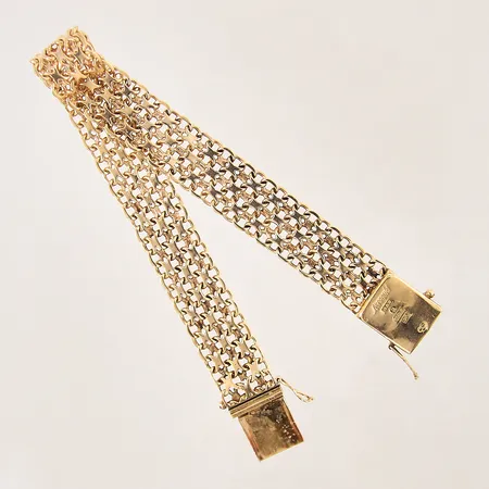 Armband X-länk, längd 19cm, bredd 12mm, 18K.  Vikt: 25,1 g