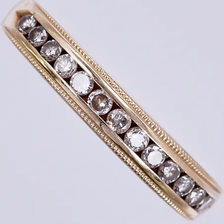 Ring med diamanter ca 13x0,02ct, stl: 17½, bredd: ca 2-3mm, 14K Vikt: 2,6 g