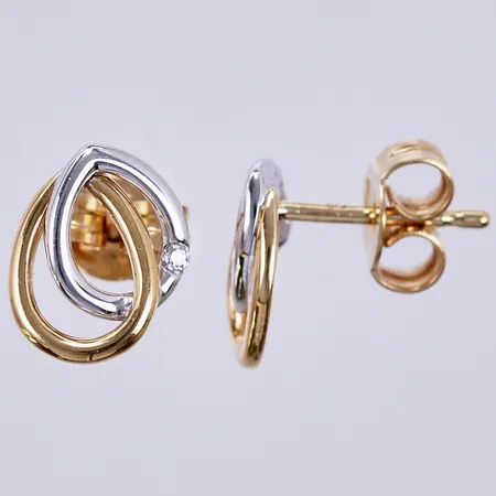 Ett par örhängen vitguld/gult guld med diamanter ca 2x0,01ct, längd: ca 1cm, bredd: ca 8mm, 18K Vikt: 1,6 g