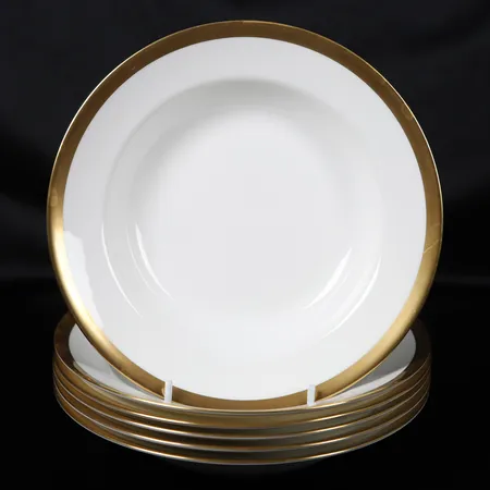 Sex djupa tallrikar, "Nobel", formgiven av Karin Björquist, porslin med guldkant, Ø ca 22cm, bruksslitage, repor.  Vikt: 0 g Skickas med postpaket.