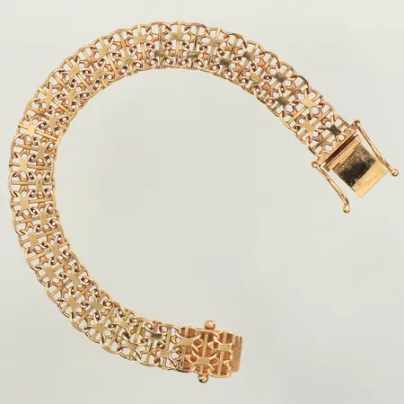 Armband X-länk med stav, längd 16,5cm, bredd 9,7mm, Guldsmedjan Täby AB, 18K  Vikt: 15,5 g