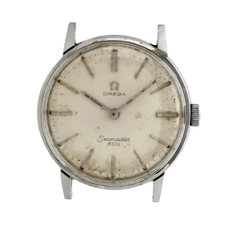 Herrur Omega Seamaster 600, stål, Ø34 mm, manuell - fullt fungerande, kaliber 601, referensnummer 135.001, serienummer 21987040, missfärgning på urtavla, större repor på bakboetten, plexi - repor