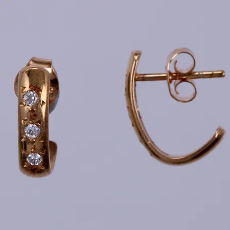 Ett par örhängen med vita stenar, längd: ca 1,2cm, bredd: ca 3mm, 18K Vikt: 2,2 g