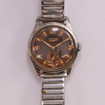 Herrur Longines, 34mm, stål, manuell, boettnr:6263 8/721, Cal.12.68Z, verknr:9512521, skadad svart urtavla, max uppdragen, går ej.