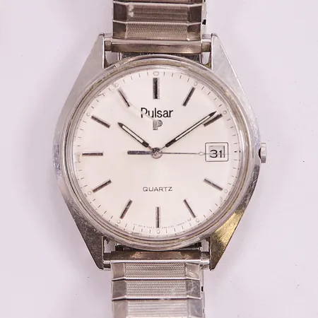 Herrur Pulsar, 36mm, stål, quartz, glas sprucket, går ej. Vikt: 0 g