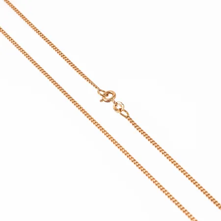 Kedja pansar i 18K guld. Den är 1,7 mm bred, 45,5 cm lång och väger 5,0g. Springring. Från Balestra.