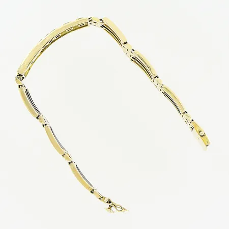 Armband, vita stenar infattade in rörlig skena, 20,5cm, bredd 13mm, en större sten/platta saknas, 14K Vikt: 43,5 g