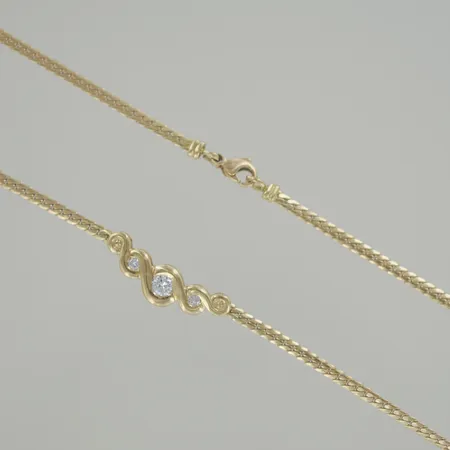 collier med diamanter  L 47 cm 18k,10,1g. lite ojämn i länken