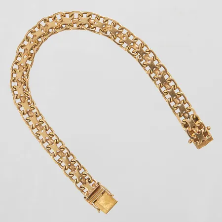 Armband X-länk, längd ca 19,5cm, bredd 8,5mm, 18K Vikt: 24,9 g