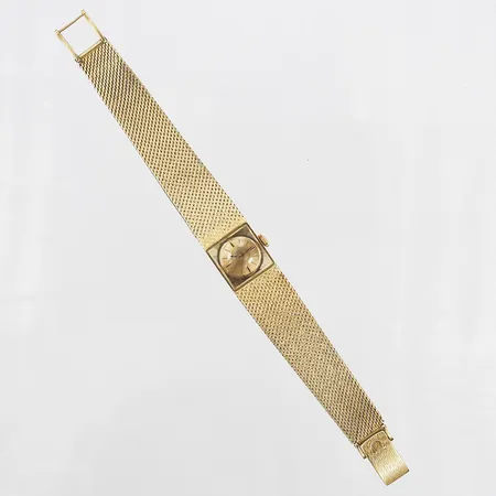 Damur Omega, 18K, manuell, Ø15mm, med integrerad länk 17cm, defekt, går ej, etui, bruttovikt 45,7g Vikt: 45,7 g